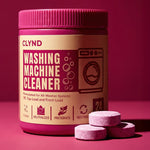Clynd washing machine cleaner with pink lid and tablets on a red background